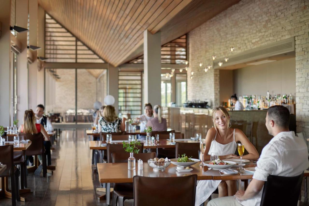 Minthis Resort Tsadha Dış mekan fotoğraf The restaurant